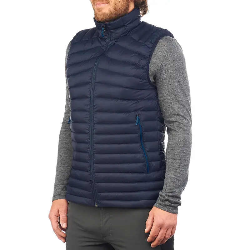 Chaleco Acolchado De Montaña Y Trekking Plumón Hombre Forclaz MT100 Azul 1 Chaleco Acolchado De Montaña Y Trekking Plumón Hombre Forclaz MT100 Azul
